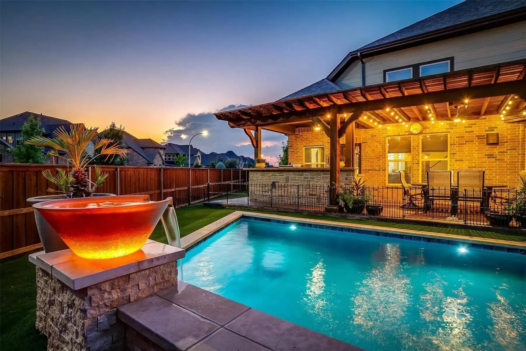 Custom pool with fire feature and LED lighting built in the DFW Metroplex